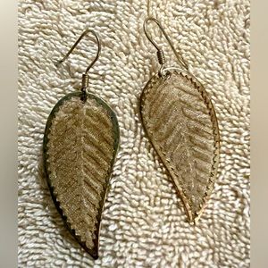 Gold tone leaf pierced ear rings.